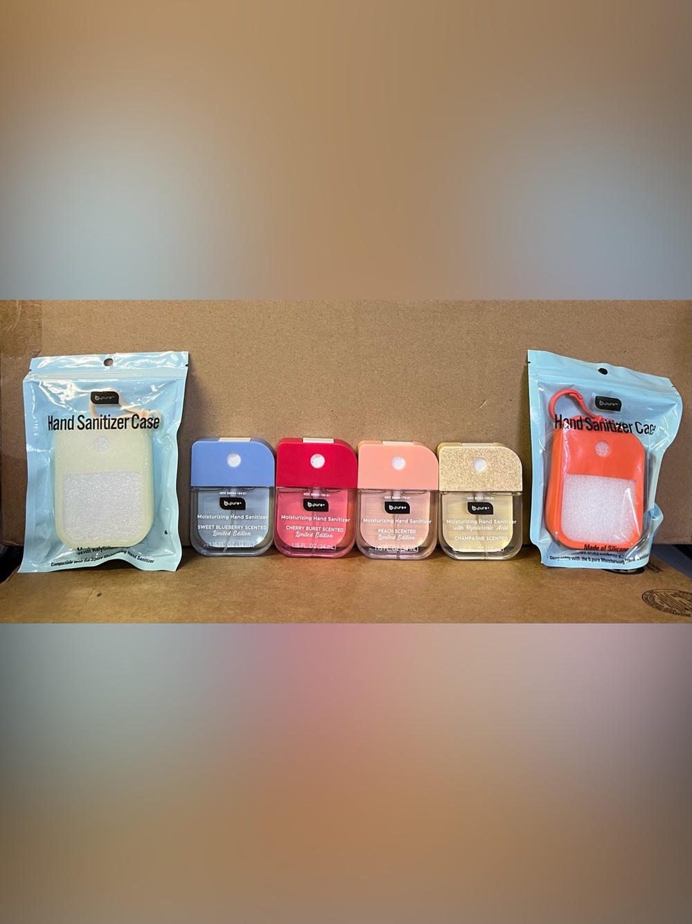 B pure Moisturizing Hand Sanitizer with 2 Silicone Case.